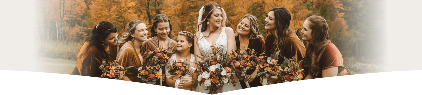 Beautiful wedding scene with bride and bridesmaids in autumn setting