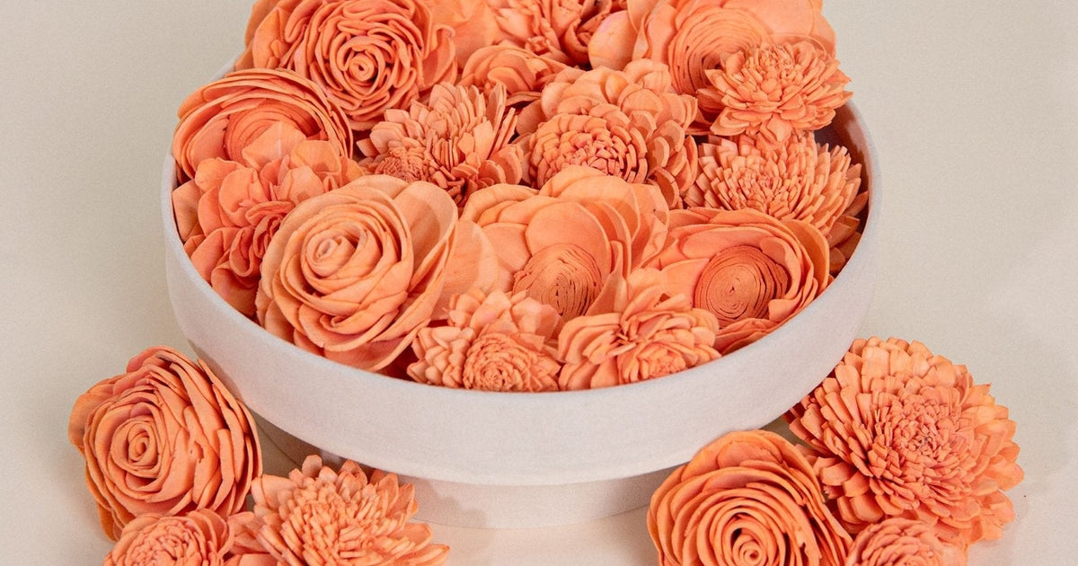 https://www.solawoodflowers.com/cdn/shop/files/25-pack-of-coral-colored-mixed-flowers-171414.jpg?crop=center&height=630&v=1724147940&width=1200