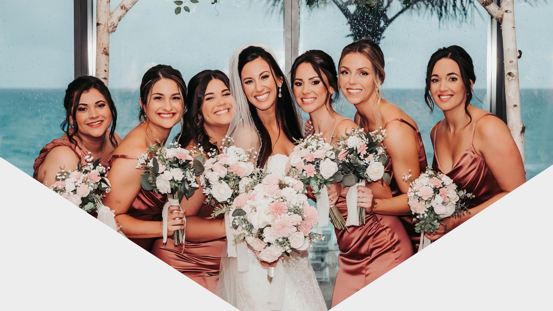 Beautiful wedding scene with bride and bridesmaids in autumn setting
