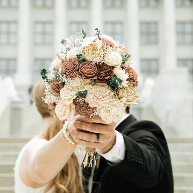 Sola wood bridal bouquet in a real wedding photo